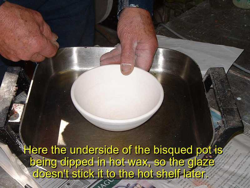 Dip underside of pot in hot wax