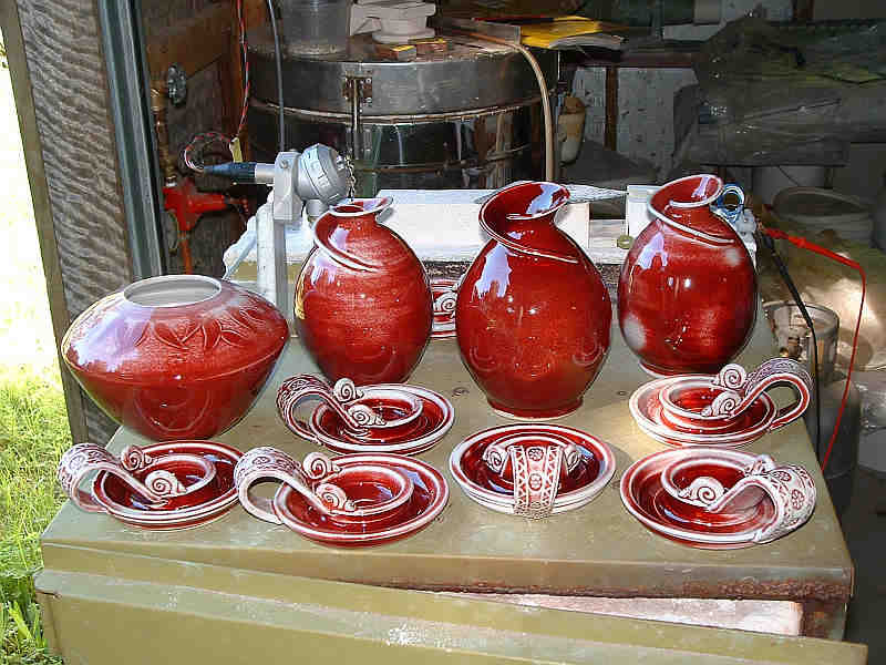 Group of
              copper red pots