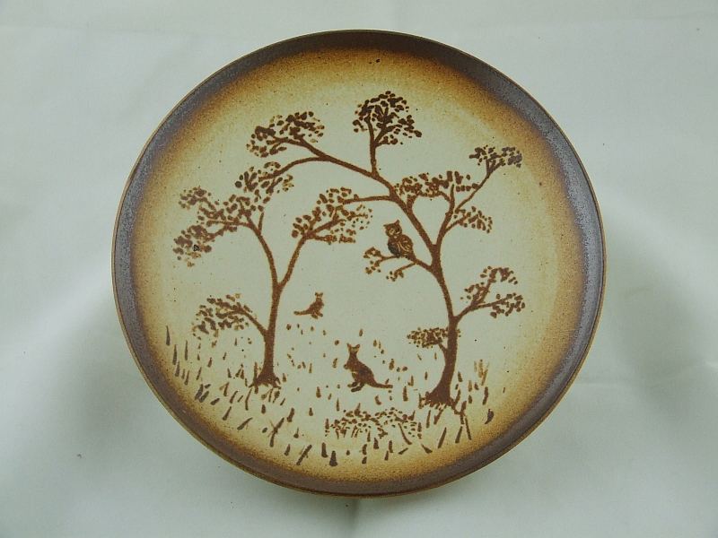 Owl in trees,
              kangaroos on the ground